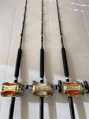 3 Shimano Tiagra 50W 2 speed reels with rods.